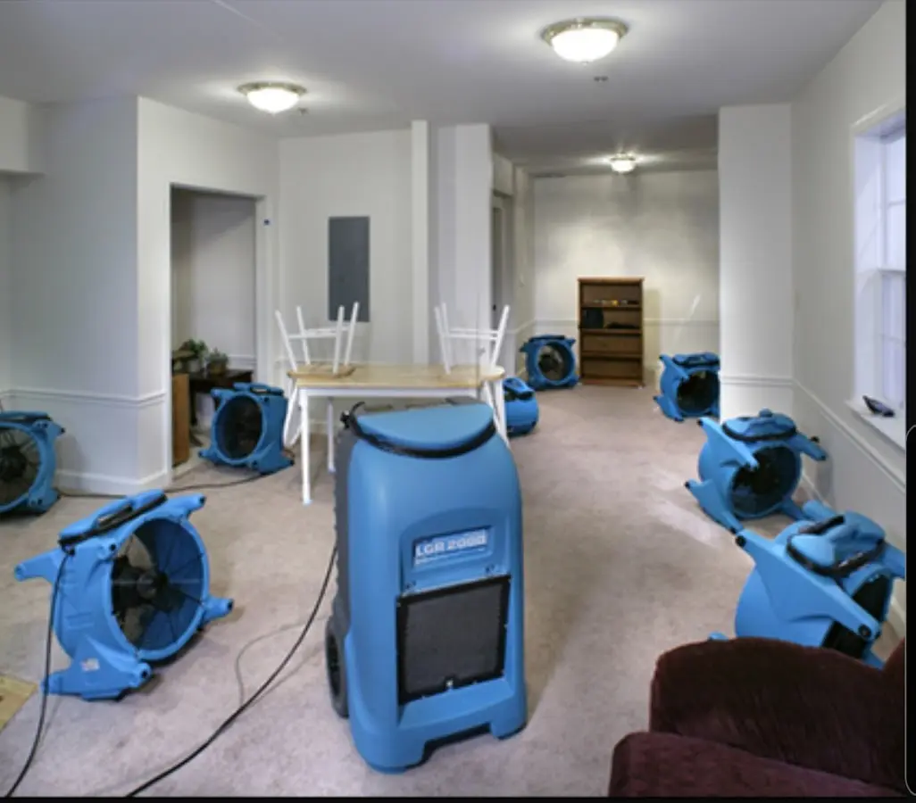 Air movers and dehumidifier setup for Water Damage Restoration in West Loch Estate