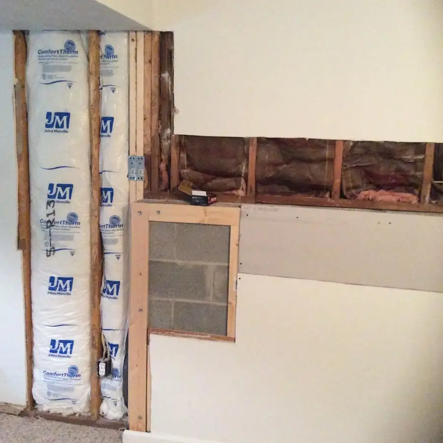Wall insulation replacement during Structural Drying in West Loch Estate